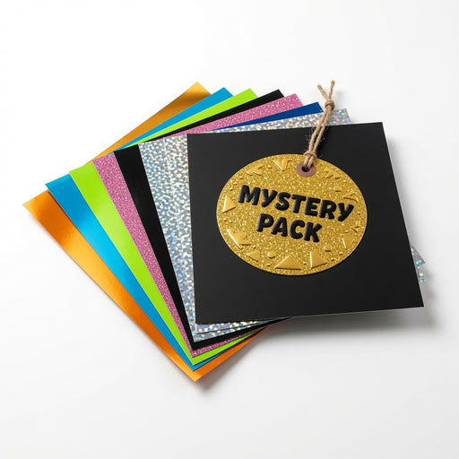 Heat Transfer Vinyl Mystery Box — assorted stack of colorful HTV sheets and rolls for Cricut and heat press