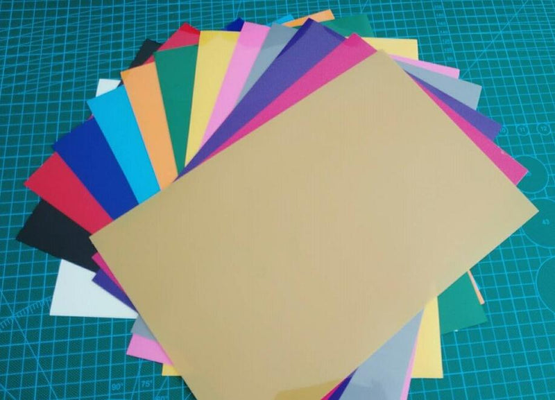 Bundle of 13 heat transfer vinyl sheets, each 12 x 12 inches, in assorted colors for Cricut