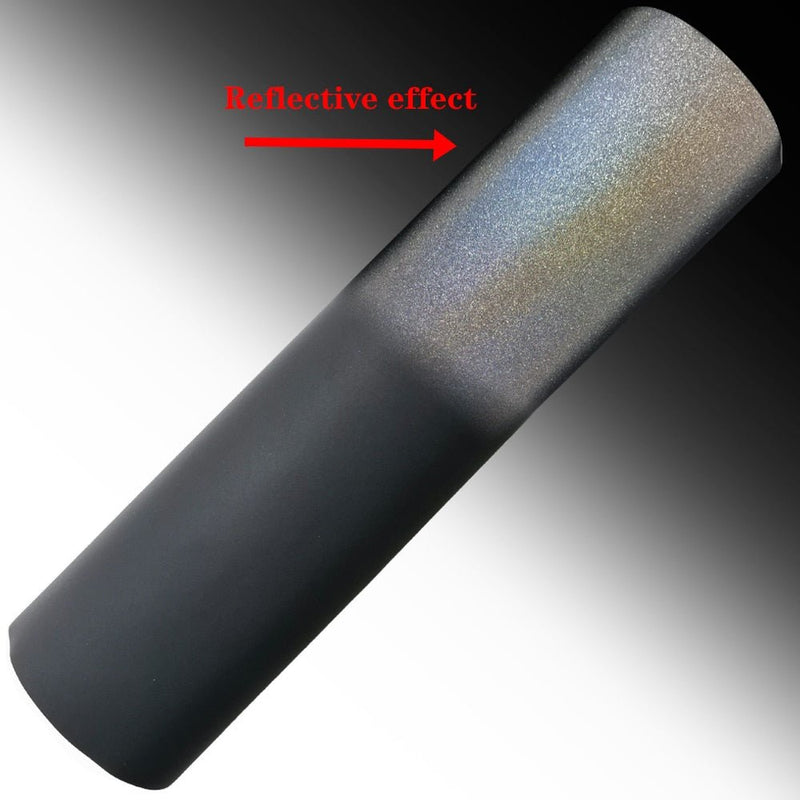 Reflective colorful heat transfer vinyl that appears colored in daylight and flares bright under direct light